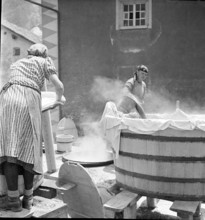 Women washing at the Hinterrhein, 1941.