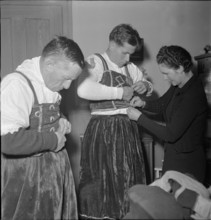 Preparations for Silvesterchlausen in Urnaesch, 1945.