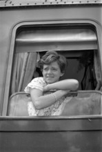 Rita Pavone looking out of train window 1966.