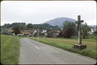 Cross on the roadside in Vellerat, 1980.