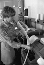 UPI office, telexist at telex terminal, 1970.