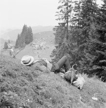 Sleeping man at public festival in the Emmental, in 1948.