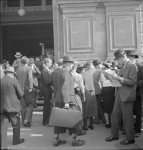 People at railway station; 1939.