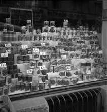 Goods on display in a grocery store; 1942.