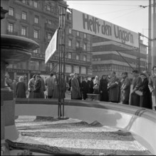 Money drive in fountain trough for help in Hungary, Zurich 1956.