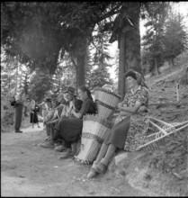 Farmers having a break at the wayside, Bettmeralp 1952.