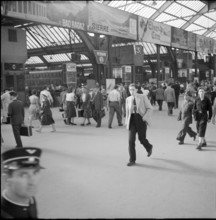 Travellers at Zurich Main Station, 1952.