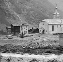 Devastation in the Valais village Tasch after flood;  1957.
