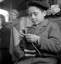 Boy knitting