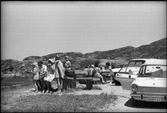 Families having a picnic on Simplon pass 1971