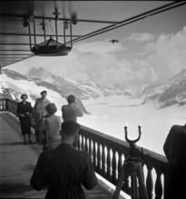 Tourists enjoy the view at the Kleine Scheidegg; 1957