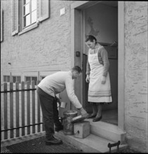 Ilk man serving customer; 1941