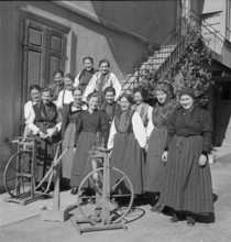 A group of women with spinning wheels, 1941