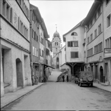 Narrow street in Eglisau with church tower 1959