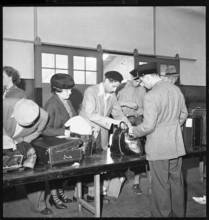 Baggage check before leaving; 1945