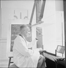 Mr. Portier working on a carpet at the Gobelin exhibition, Lausanne 1946