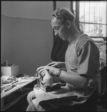 Polish refugee; shoemaker's; 1945