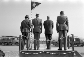 Swiss Army Parade in Emmen; Rudolf Gnägi between military personnel 1972