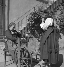 Woman spinning wool, 1941