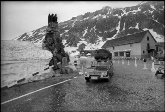 Car on Gotthard pass at season opening 1971