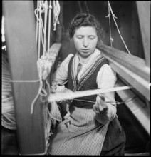 Woman working in weaving mill in the Münstertal, 1946