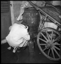 Spy transmitting a message; 1946