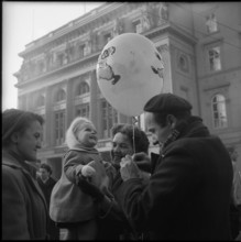 Small child receives a balloon, Bern 1955