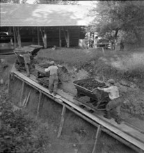 miners; miner car in coal mine; 1941