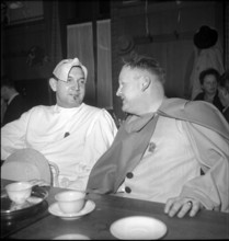 Carnival participants in the restaurant, Basel 1947