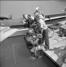 After WW 2: recovery of a US bomber, train 1952