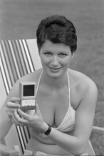 Woman with radiation gauge, 1973