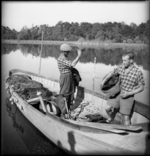 Swiss fishermen on Lake Constance on fishing boat 1945