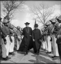 Priests come to bless the bread in Valais village, 1942