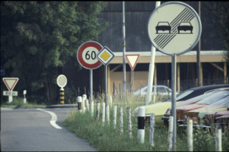 Road sign: No overtaking at the end