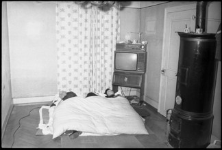 housing shortage; family living in one room 1971