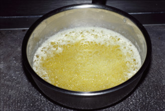 Melted butter in a pan
