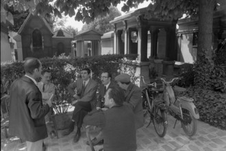 Men in a cemetery in Paris 1968
