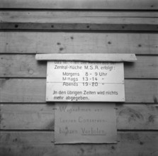 Announcement outside of military kitchen; 1940