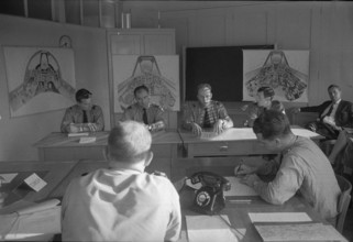 Military pilots discussing tactical exercise, Dübendorf 1963