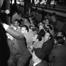 Italian workers leaving for elections in their home country, 1953