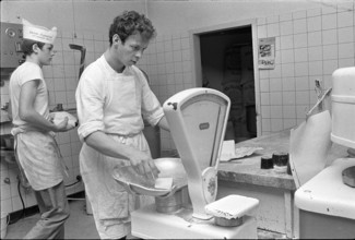 Berne, examinee weighing out ingredient; 1970