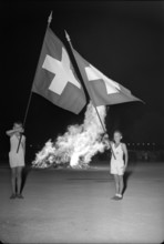 Neuchatel; national holiday celebration; boys holding national flag; 1947