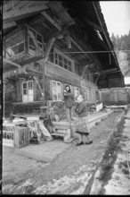 Elderly woman with child in the Emmental, 1970