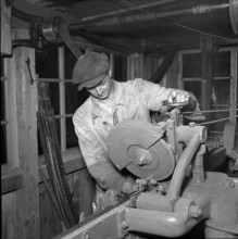 Alpthal; carpenter in his workshop; 1951