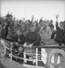 German tourists at the harbor of Romanshorn, 1948
