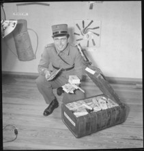 Customs Officer with Smuggled Goods, Swiss Customs Museum, 1949