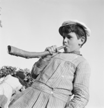 Boy playing the horn, 1944