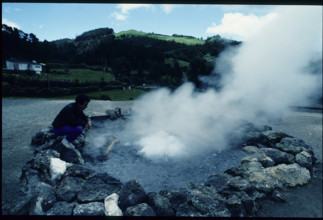 Man by volcanic spring, Geyser, Azores 1984