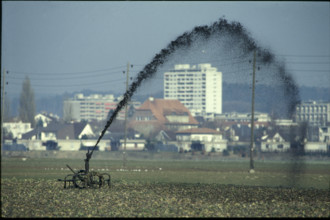 Sludge sprayer on a meadow, 1980
