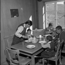 Tibetan refugees at lunch, underwater 1961